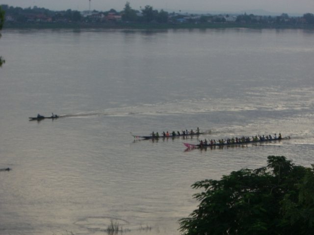 Traditional long-tail boat race on the Mekong river in northern Thailand